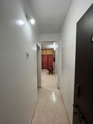 Building Lobby in 1 BHK Apartment at Karan Park, Wadgaon Sheri – for Rent
