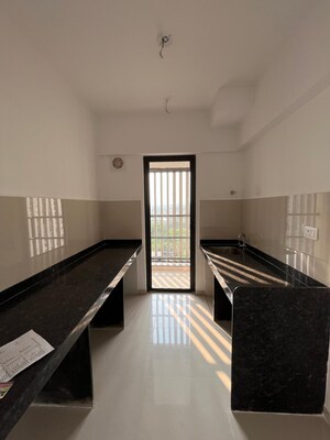 Kitchen in 2.5 BHK Apartment at Lodha Palava Downtown, Dombivli East – for Sale