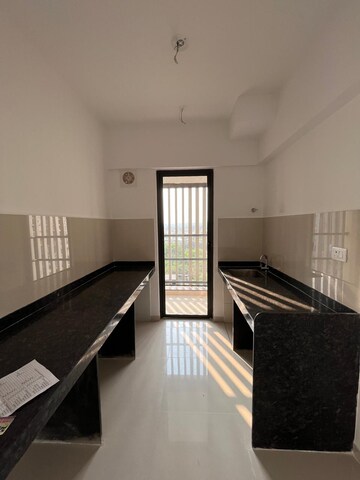 Kitchen in 2.5 BHK Apartment at Lodha Palava Downtown, Dombivli East – for Rent