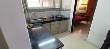 Kitchen in 1 BHK Apartment at Radha Residency Pune, J M Road – for Rent