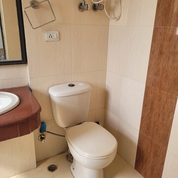 Bathroom in 4 BHK Apartment at AWHO Township Gurjinder Vihar, Omega Ii Greater Noida – for Rent
