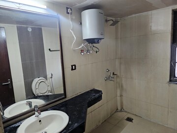Bathroom in 4 BHK Apartment at AWHO Township Gurjinder Vihar, Omega Ii Greater Noida – for Rent
