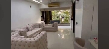 Living Room in 2 BHK Apartment at Amal Juhu Sheetal CHS, Juhu – for Sale