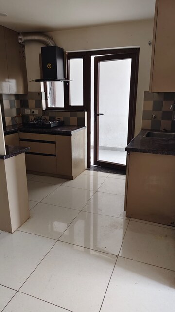 Kitchen in 3 BHK Apartment at Azeagaia Botanica, Vrindavan Yojna – for Sale