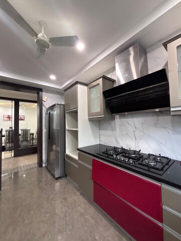 Kitchen in 4 BHK Apartment at Green Park Extension – for Rent