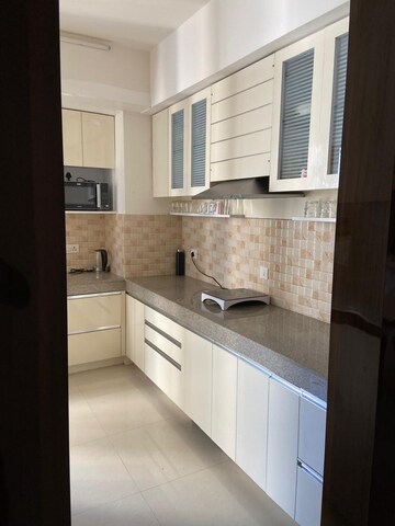 Kitchen in 4 BHK Apartment at Shalimar One World Valencia County, Gomti Nagar – for Sale