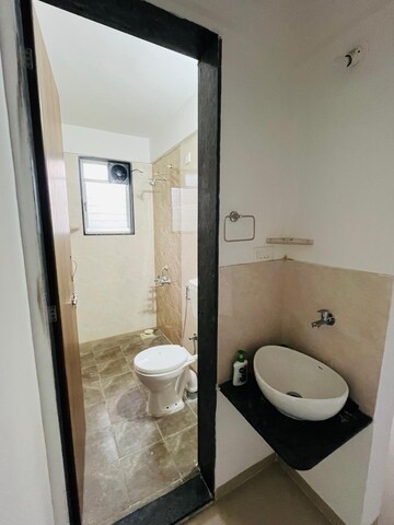 Bathroom in 1 BHK Apartment at Shri Jagdamba CHS, Wadgaon Sheri – for Rent