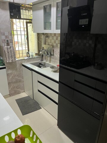 Kitchen in 3 BHK Apartment at Dream Shubhamkaroti CHS, Bhaskar Colony – for Sale