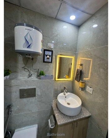 Bathroom in Studio Apartment at Kaveri City Center, Delta I Greater Noida – for Rent