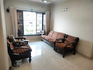 Living Room in 2 BHK Apartment at Planet Powai CHS, Powai – for Rent