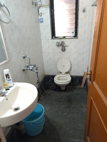 Bathroom in 3 BHK Apartment at Magnolia Enclave, Powai – for Rent