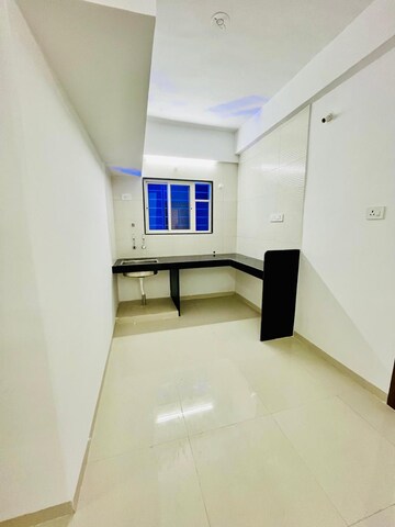 Kitchen in 1 BHK Apartment at Wadgaon Sheri – for Rent