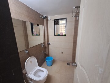 Bathroom in 2.5 BHK Apartment at Vijay Enclave, Waghbil – for Rent