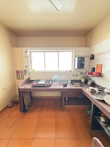 Kitchen in 2 BHK Apartment at Saurabh Garden CHS, Anand Nagar – for Sale