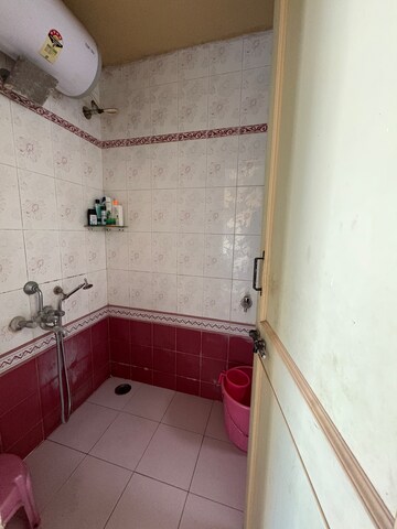 Bathroom in 2 BHK Apartment at Saurabh Garden CHS, Anand Nagar – for Sale