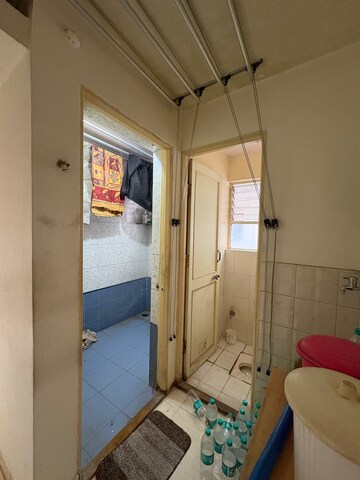 Bathroom in 2 BHK Apartment at Saurabh Garden CHS, Anand Nagar – for Sale