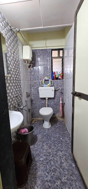 Bathroom in 1 BHK Apartment at Puranik City, Kasarvadavali – for Rent