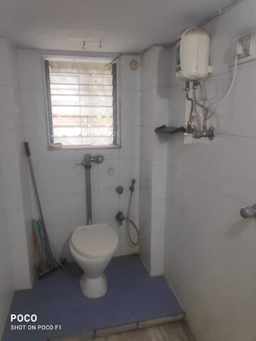Bathroom in 2 BHK Apartment at Rehmat Tower, Santacruz East – for Rent