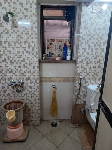 Bathroom in 5 BHK Apartment at Regency Estate, Dombivli East – for Sale