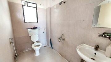 Bathroom in 2 BHK Apartment at Gurukrupa Astter, Wadgaon Sheri – for Rent