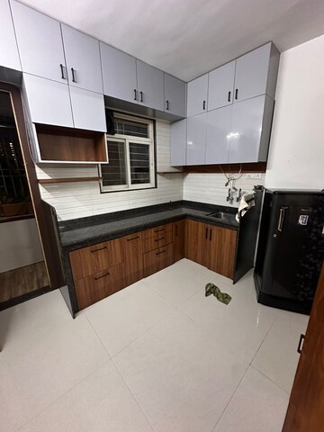 Kitchen in 2 BHK Apartment at Sumana Green Basil, Baner – for Rent