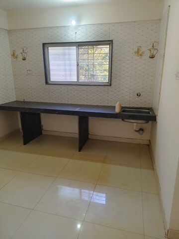 Kitchen in 1 BHK Apartment at Wadgaon Sheri – for Rent