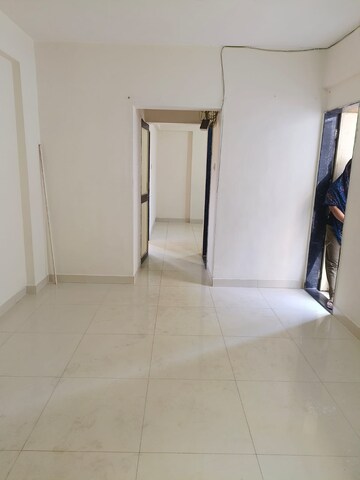 Building Lobby in 1 BHK Apartment at Wadgaon Sheri – for Rent