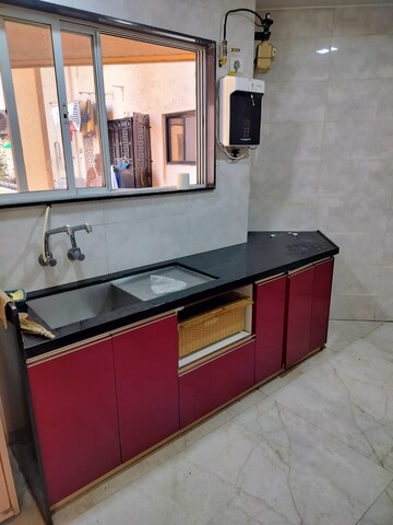Kitchen in 3 BHK Apartment at Magarpatta Daffodils Apartment, Hadapsar – for Sale