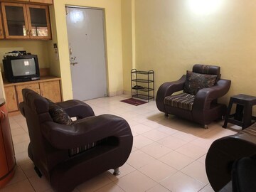 Living Room in 2 BHK Apartment at Guru Ganesh Nagar Society, Kothrud – for Rent