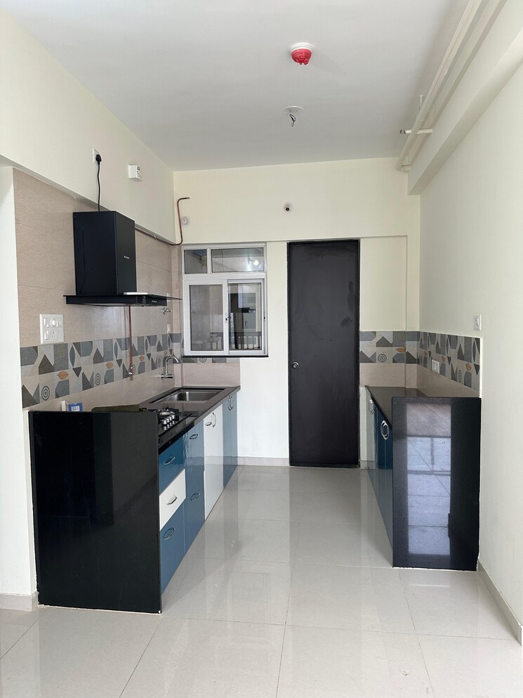 Kitchen, kolte-patil-life-republic-sec-r7-7th-avenue-i 2 Bedroom 950 Sq.Ft. Apartment In Hinjewadi Pune 9723377