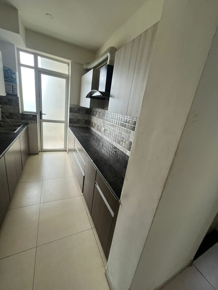 Kitchen, international airport road 2 Bedroom 900 Sq.Ft. Apartment In International Airport Road Zirakpur 9723441