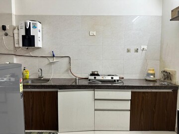 Kitchen in 2 BHK Apartment at Duville Riverdale Heights, Kharadi – for Rent