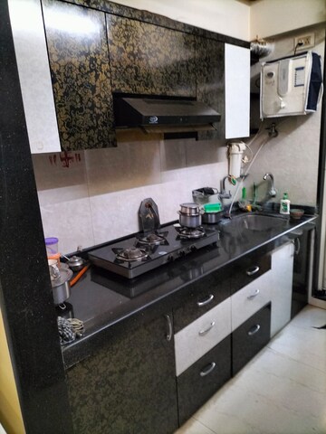 Kitchen in 2 BHK Apartment at RDC Pinewood, Thane West – for Sale