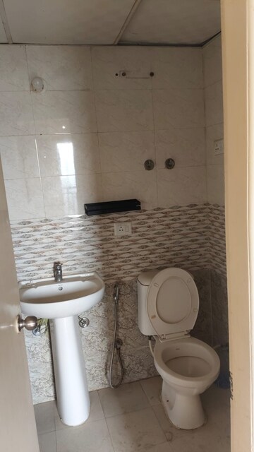 Bathroom in 3 BHK Apartment at Mahagun Mywoods, Sector 16c Greater Noida – for Sale
