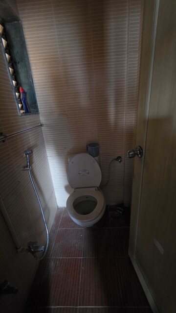 Bathroom in 1 BHK Apartment at Eden Woods complex, Manpada – for Sale