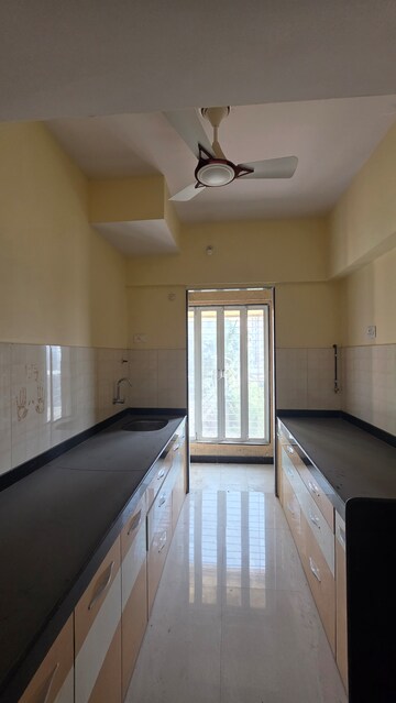 Kitchen in 2 BHK Apartment at Eden Woods complex, Manpada – for Sale