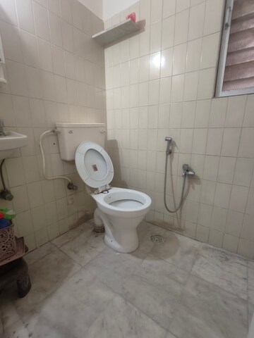 Bathroom in 1 BHK Apartment at Flower Valley Complex, Khopat – for Rent