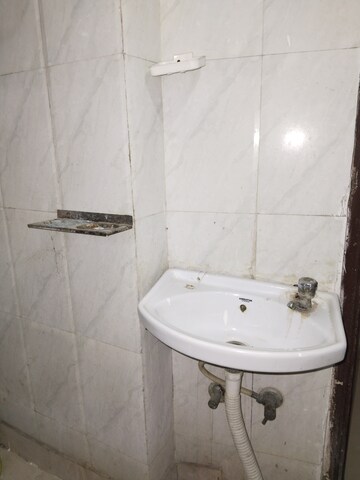 Bathroom in 2 BHK Apartment at Khirki Extension – for Rent