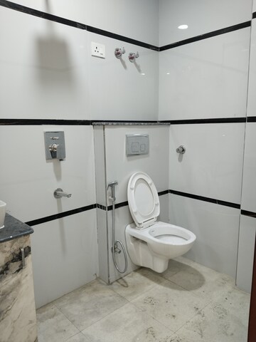 Bathroom in 4 BHK Apartment at Panchsheel Vihar – for Sale
