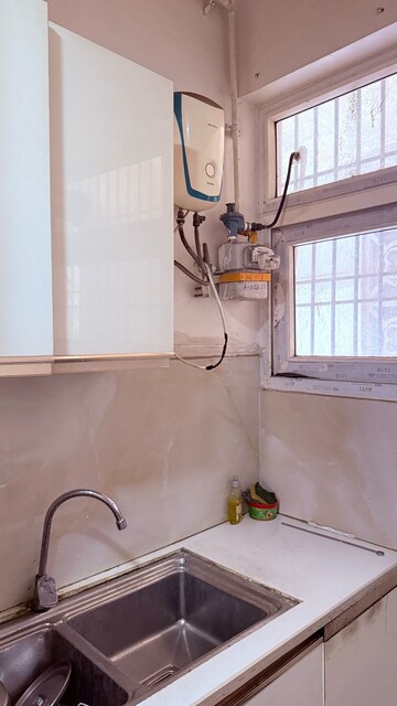 Bathroom in 3 BHK Apartment at Mahagun Mirabella, Sector 79 – for Rent