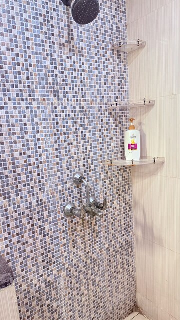 Bathroom in 3 BHK Apartment at Mahagun Mirabella, Sector 79 – for Rent