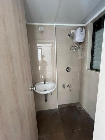 Bathroom in 1 BHK Apartment at Lodha Palava Downtown, Dombivli East – for Rent
