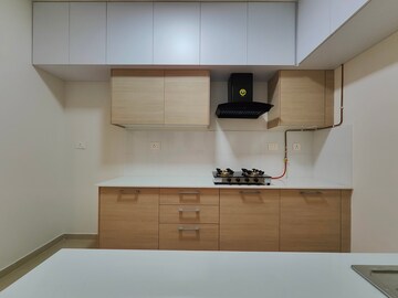 Kitchen in 3.5 BHK Apartment at Bhartiya Nikoo Homes Phase 2, Thanisandra Main Road – for Rent