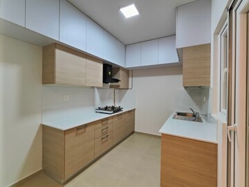 Kitchen in 3.5 BHK Apartment at Bhartiya Nikoo Homes Phase 2, Thanisandra Main Road – for Rent