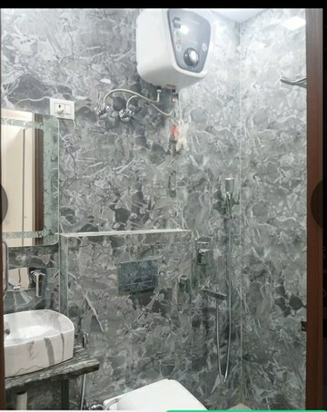 Bathroom in 2.5 BHK Builder Floor at Mansarover Garden – for Rent