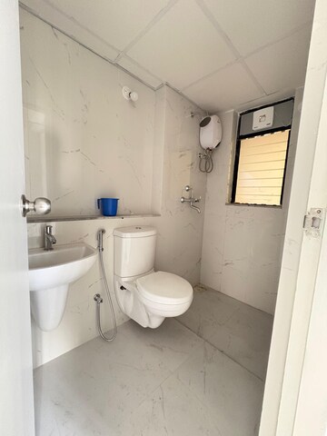Bathroom in 2 BHK Apartment at Runwal Gardens Phase I, Dombivli East – for Rent