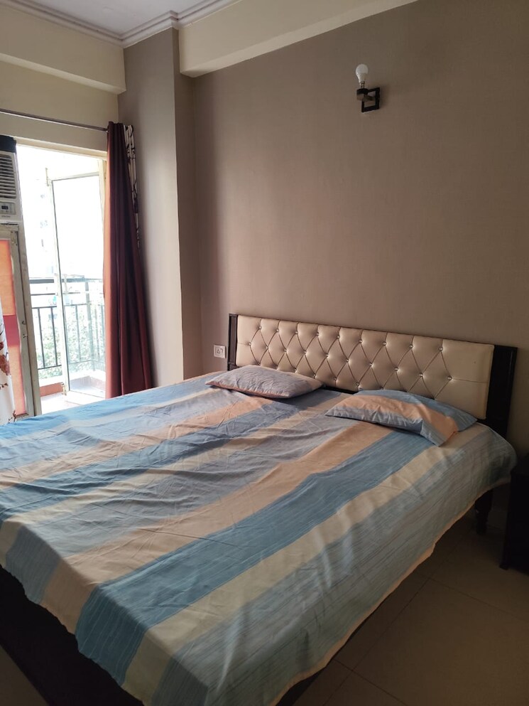 Bedroom, aims-golf-city 2 Bedroom 950 Sq.Ft. Apartment In Sector 75 Noida 9724006