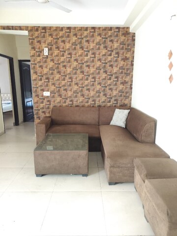 Living Room in 2 BHK Apartment at Aims Golf City, Sector 75 – for Rent