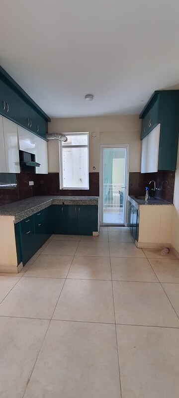 Kitchen in 3 BHK Apartment at JKG Palm Resort, Raj Nagar Extension – for Rent