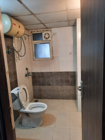 Bathroom in 2 BHK Apartment at Nimbus The Hyde park, Sector 78 – for Rent